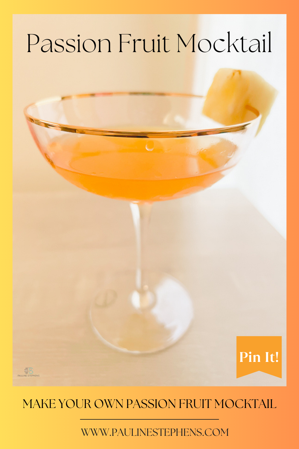 A gold rimmed glass filled with Passion Fruit Mocktail and garnished with a slice of pineapple.