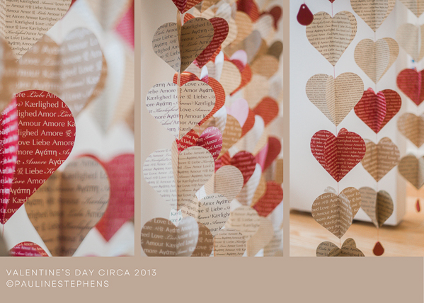 photo of paper hearts cut out to decorate a room for valentines day